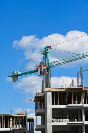 Photo for Building construction site work with tower crane - Royalty Free Image