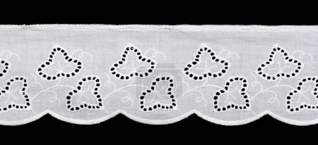 Téléchargez les photos : White floral lace isolated on black background - en image libre de droit