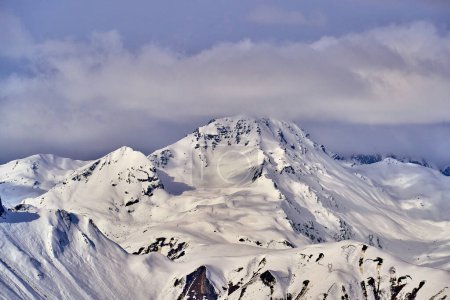 Photo for Breathtaking beautiful panoramic view on Snow Alps - snow-capped winter mountain peaks around French Alps mountains, The Three Valleys: Courchevel, Val Thorens, Meribel (Les Trois Vallees), France. - Royalty Free Image