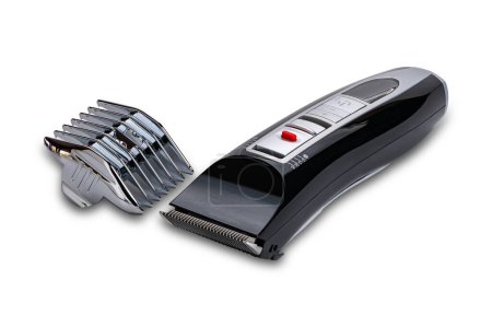 Electric professional pet grooming clippers with nozzle isolated on white background with clipping path.