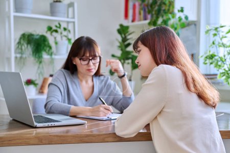 Photo for Young woman university college student at meeting with female professional mental therapist, social worker, counselor, behavior. Psychology therapy help counseling treatment support, mental health - Royalty Free Image