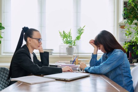 Photo for Mental therapy session of sad unhappy depressed stressed mature female with professional psychologist counselor. Talking serious women sitting at table, psychology psychotherapy support help treatment - Royalty Free Image