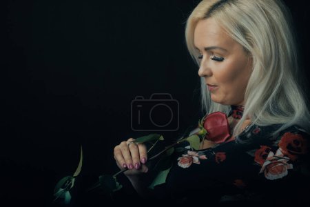 Photo for In the end, the flower helped that she forgave him. - Royalty Free Image