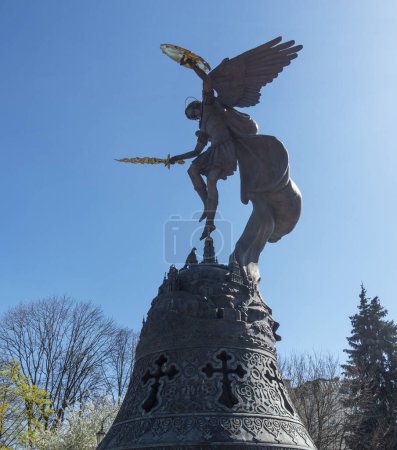 Photo for Kyiv, Ukraine. April 9, 2024 Fountain with a sculpture of the Archangel Michael in the Vladimirskaya Gorka park - Royalty Free Image