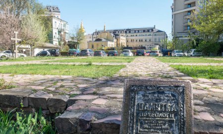 Photo for Foundation of the Fedorovsky monastery 12th century in Kyiv on Vladimirskaya street. TRANSLATION OF TEXT: Archeological monument, foundation of the church of the Fedorovsky Monastery - Royalty Free Image