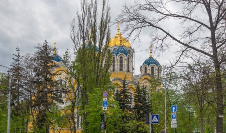 View of the Vladimir Cathedral in Kyiv surrounded by spring trees