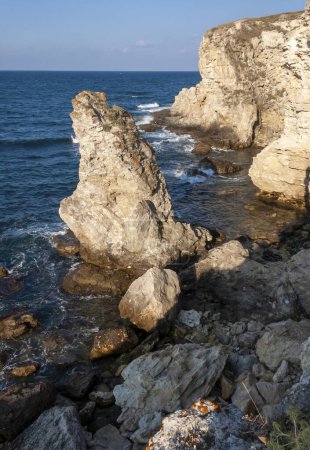 Photo for High limestone coastal cliffs against the backdrop of the Black Sea on Tarkhankut, Atlesh, western Crimea - Royalty Free Image