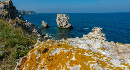Photo for View of the steep banks and rocks in the water in the Dzhangul tract, western Crimea - Royalty Free Image