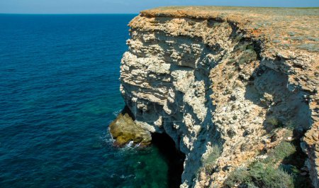 Photo for Steep karst limestone shores and rocks in the Dzhangul tract, western Crimea, Tarkhankut - Royalty Free Image