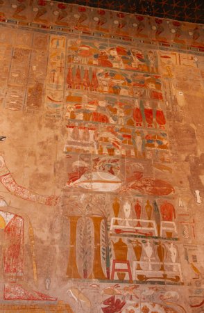 Photo for EGYPT,  LUXOR - MARCH 01, 2019:  archaeological site, drawings and geoglyphs on the walls of an ancient temple, the temple of Hatshepsut near Luxor in Egypt - Royalty Free Image