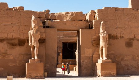 Photo for EGYPT,  LUXOR - MARCH 01, 2019: ancient sandstone statues, Karnak Temple, Hall of caryatids. Luxor, Egypt - Royalty Free Image
