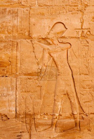 Photo for EGYPT,  LUXOR - MARCH 01, 2019: ancient Egyptian hieroglyphs, drawings and inscriptions on the walls and columns in the temple of Karnak in Luxor - Royalty Free Image