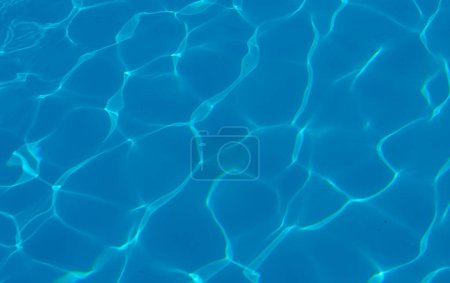 Photo for The reflection of the suns rays in the water in the pool with sea water, The glare of the sun, Egypt - Royalty Free Image