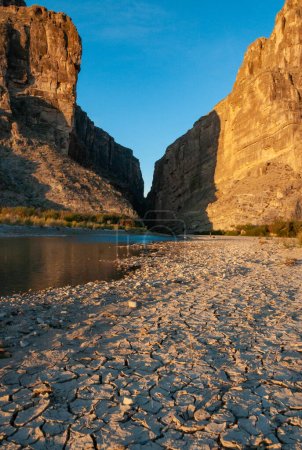 A view of Santa Elena Canyon in Big Bend National Park. Cliffs rise steeply from Rio Grande River