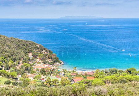Photo for ISOLA D'ELBA, ITALY - August 29, 2018: day view of sea and coastline and Spartaia beach in Elba island, Tuscany, Italy. - Royalty Free Image