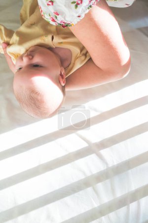 Photo for Baby in a bed. Baby room. - Royalty Free Image