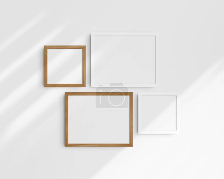 Photo for Gallery wall mockup set, 4 cherry wood and white frames. Clean, modern, and minimalist frame mockup. Two horizontal frames and two square frames, 14x11 (14:11), 8x8 (1:1) inches, on a white wall with shadows. - Royalty Free Image