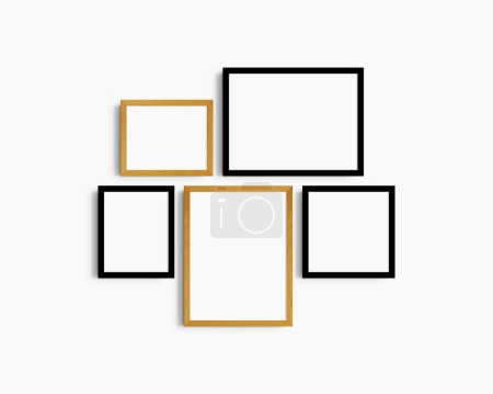 Téléchargez les photos : Coffret maquette murale Galerie, 5 cadres en bois de chêne noir et jaune. Modèle de cadre moderne et minimaliste. Deux cadres horizontaux, deux cadres verticaux, et un cadre carré, 12x16 (3 : 4), 16x12 (4 : 3), 8x10 (4 : 5), 10x8 (5 : 4), 10x10 (1 : 1) pouces, sur un mur blanc. - en image libre de droit
