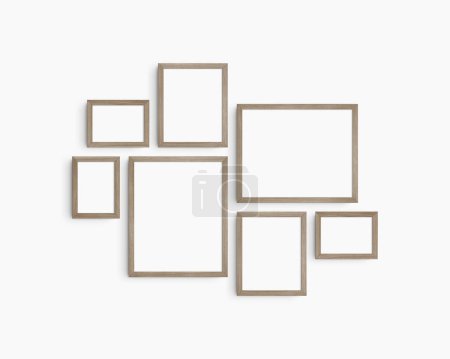 Photo for Gallery wall mockup set, 7 natural wood frames. Clean, modern, and minimalist frame mockup. Three horizontal frames, and four vertical frames, 5x7 (5:7), 7x5 (7:5), 8x10 (4:5), 12x15 (4:5), 15x12 (5:4) inches, on a white wall. - Royalty Free Image