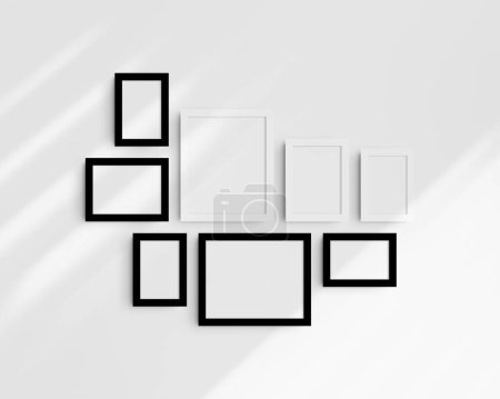 Photo for Gallery wall mockup set, 8 black and white frames. Clean, modern, and minimalist frame mockup. Five vertical frames, and three horizontal frames, 4x6 (2:3), 6x4 (3:2), 5x7 (5:7), 7x5 (7:5), 8x10 (4:5), 10x8 (5:4) inches, on a white wall with shadows. - Royalty Free Image
