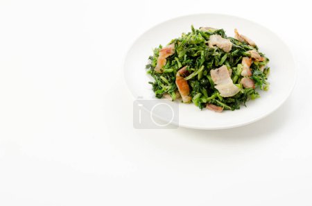 Téléchargez les photos : Stir-fried leaf radish with pork belly - en image libre de droit
