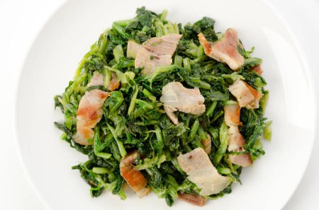 Téléchargez les photos : Stir-fried leaf radish with pork belly - en image libre de droit
