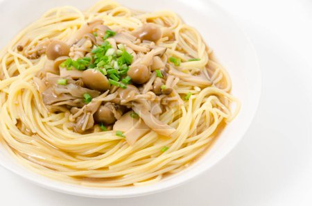 Photo for Japanese-style mushroom soup pasta on white background - Royalty Free Image
