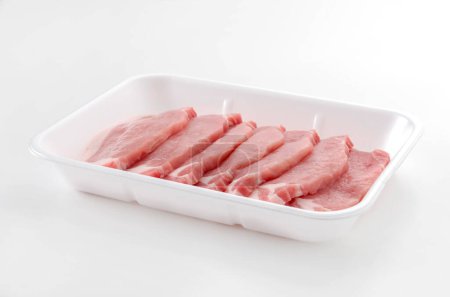 Pork meat inside styrofoam tray in White background.