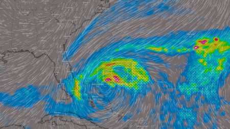 Foto de Dresde, Alemania - 9 de noviembre de 2022: Mapa de la costa este de Estados Unidos y América Central en el servicio web del tiempo ventoso que muestra el huracán Nicole, tormenta tropical con fuertes lluvias de truenos. - Imagen libre de derechos