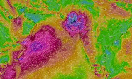 Foto de Dresde, Alemania Junio 16, 2023 Mapa en el servicio web del tiempo ventoso que muestra una poderosa tormenta tropical llamada Biparjoy acercándose a la India con fuerte viento y fuertes lluvias. - Imagen libre de derechos