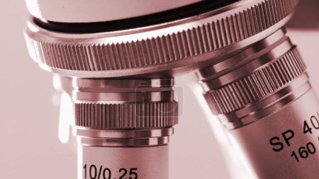 Photo for Close-up view of magnification mechanism of microscope lens. - Royalty Free Image