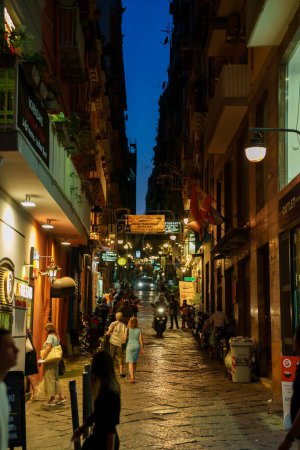 Foto de Naples, Italy - 11.06.2022: Crowdy night street in the old town. - Imagen libre de derechos