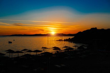 Beautiful sunset on Pefkos beach on the island of Rhodes in Greece.