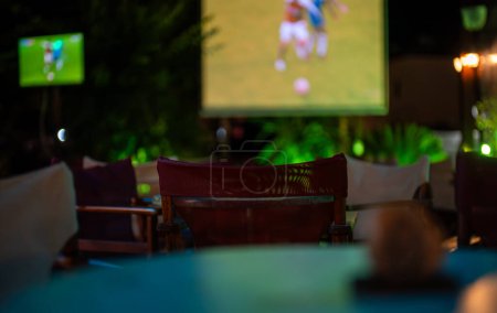 Photo for Sports bar with championship football game. - Royalty Free Image