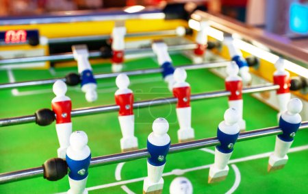 Table football game with red and blue players