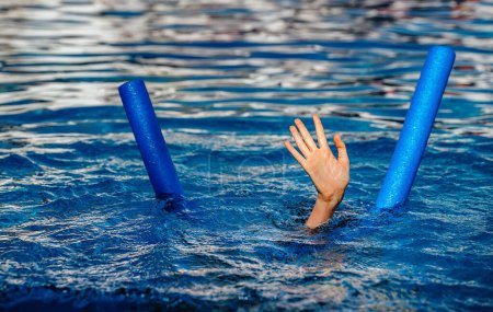 Photo for The hand of a drowning child in the pool. - Royalty Free Image