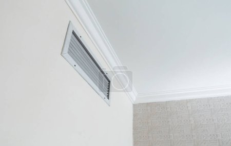 Ventilation grill in the room. Built-in air conditioner.