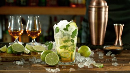 Photo for Mojito drink on bar counter. Fresh beverages background. - Royalty Free Image