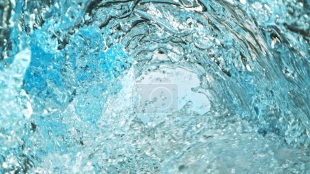 Photo for Texture of splashing water surface, tunnel shape. Abstract beverage background, freeze motion. - Royalty Free Image