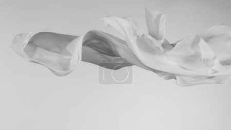 Téléchargez les photos : Tissu transparent blanc élégant et lisse séparé sur fond gris. Texture du tissu volant en mouvement de gel. - en image libre de droit