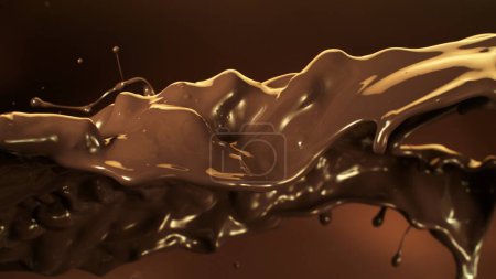 Foto de Salpicando chocolate derretido volando en el aire. Forma abstracta del chocolate. - Imagen libre de derechos