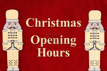 Téléchargez les photos : Message des heures d'ouverture de Noël avec des craquelins de noix d'or sur peluche rouge - en image libre de droit