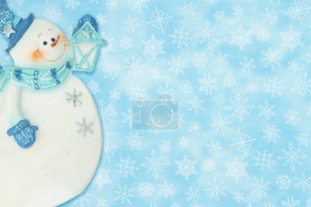 Téléchargez les photos : Bonhomme de neige d'hiver et fond de flocon de neige pour votre message d'hiver ou saisonnier - en image libre de droit