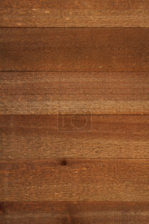Photo for Dark brown grained wood background with grain texture with copy space for your message or use as a texture - Royalty Free Image