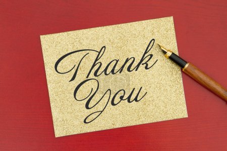 Photo for Thank you greeting card fountain pen on wood desk - Royalty Free Image