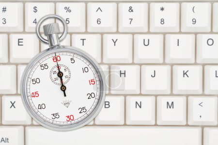 Téléchargez les photos : Chronomètre sur un clavier pour vos achats rapides ou votre message de recherche - en image libre de droit