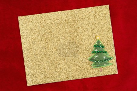Photo for Blank greeting card with Christmas tree with a fountain pen for your holiday message - Royalty Free Image