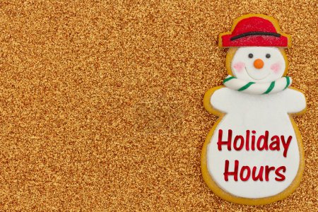 Téléchargez les photos : Heures des Fêtes message avec un bonhomme de neige sur paillettes d'or avec de l'espace pour vos heures d'ouverture de Noël - en image libre de droit