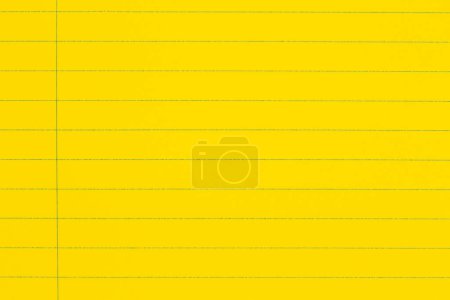 Foto de Fondo de papel de cuaderno de línea gobernado amarillo brillante para usted educación o mensaje escolar - Imagen libre de derechos