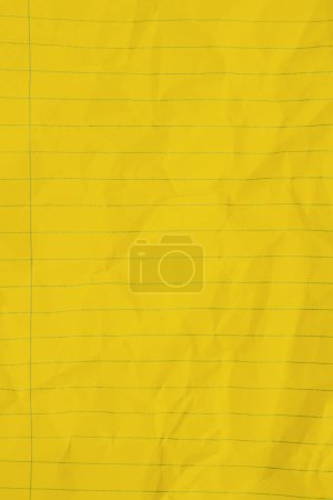 Foto de Bright yellow ruled line notebook crumpled paper background for you education or school message - Imagen libre de derechos